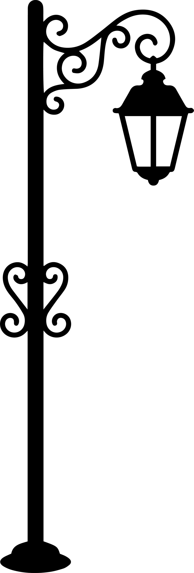Black silhouette of a vintage street lamp on a tall pole with scrollwork and a hanging lantern